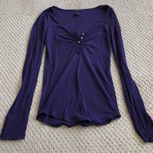 Dark purple top runs small
